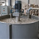 Small Egg Tray Machine Capacity And Workshop Planning Compact egg tray machine beside pulp preparation tanks