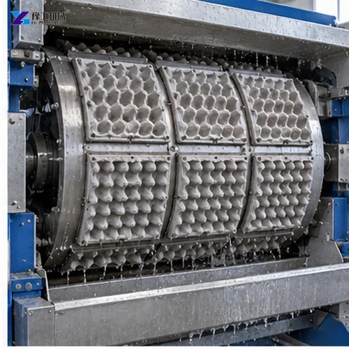 Close view of a wet molded egg tray forming drum and cell molds