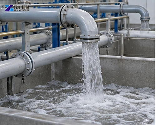 Process water flowing from a pipe into a pulp production tank
