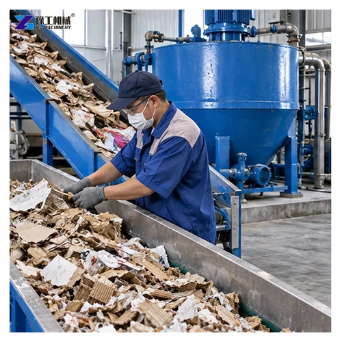 worker sorting recovered paper for a pulp molding machine
