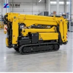 Spider Crane for Indoor Equipment Installation Folded yellow spider crane crawler shown on a factory floor