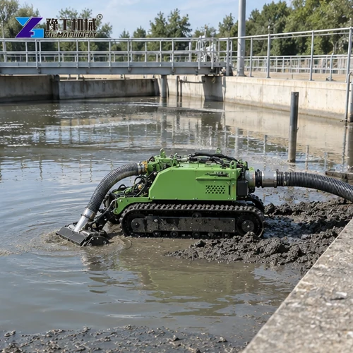 Dredging robot working at the edge of a settling pond