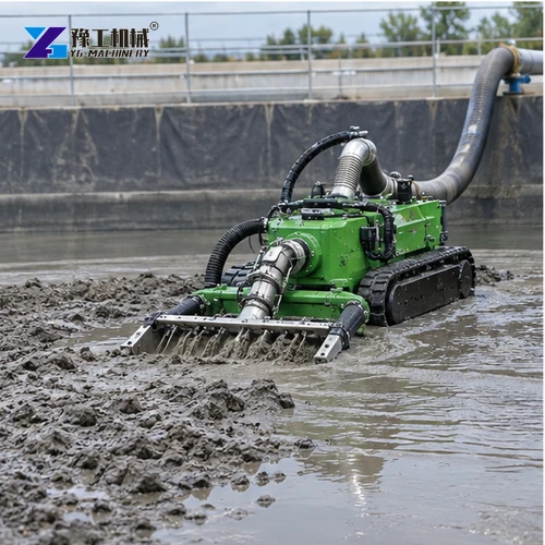 Tracked dredging robot moving settled sludge in a lined basin