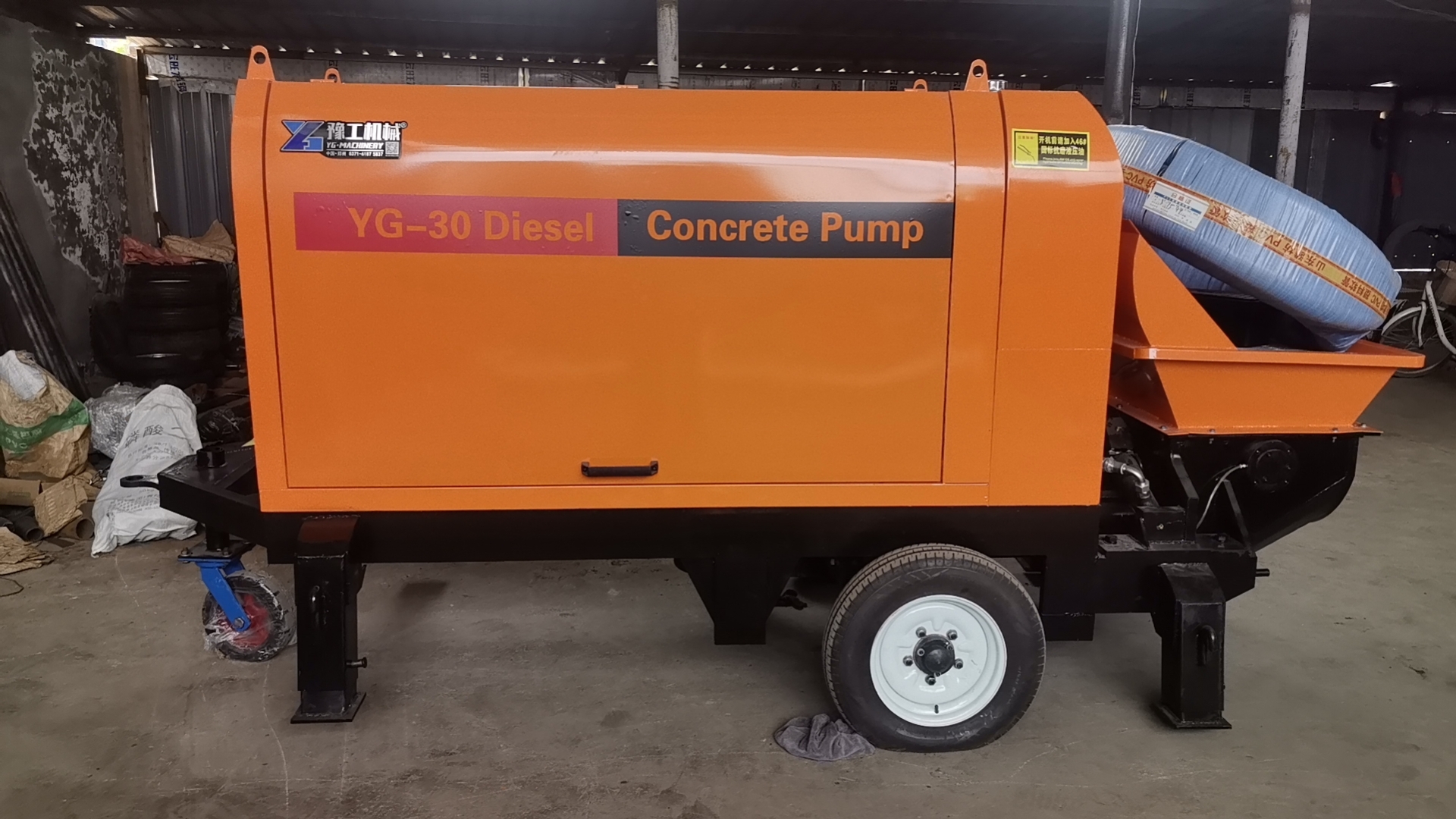 YG-30 diesel concrete pump in a front three-quarter factory view