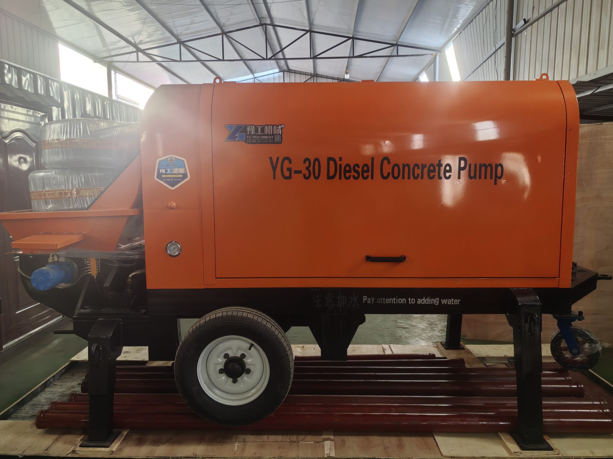 Close factory view of the YG-30 diesel concrete pump and receiving hopper