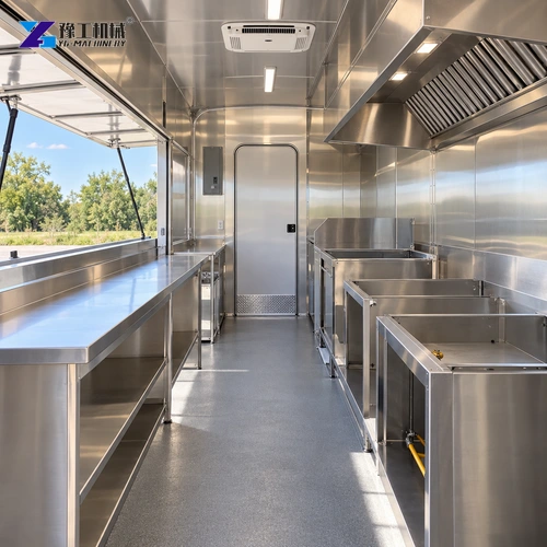 Unfitted kitchen counters inside a basic catering trailer shell