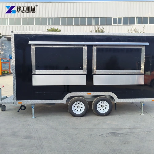 Black twin-axle catering trailer viewed directly from its closed service side