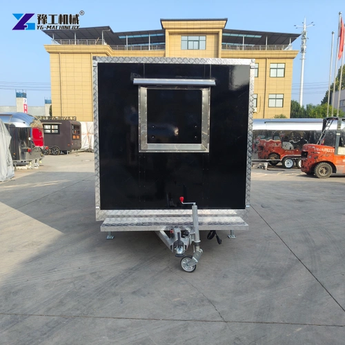 Front End Of A Black Catering Trailer With Tow Coupling And Guide Wheel