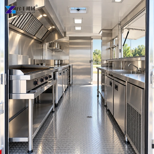Cooking appliances and refrigerator installed inside a catering trailer kitchen