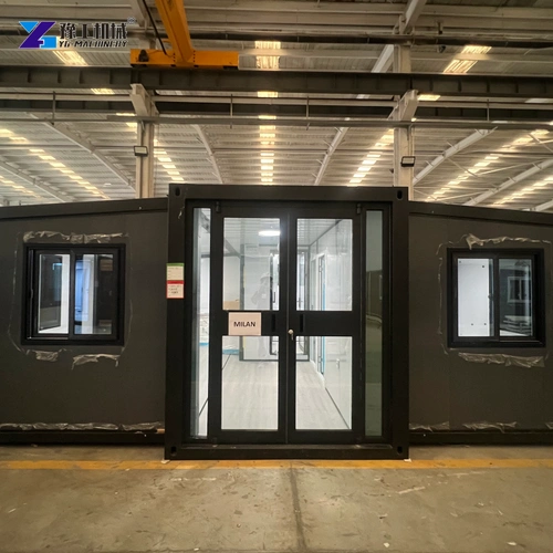 Front Entry And Windows Of A Dark Expandable House In A Factory