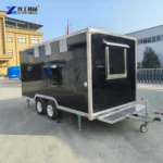 Closed Black Concession Trailer With Twin Axles And Front Connection