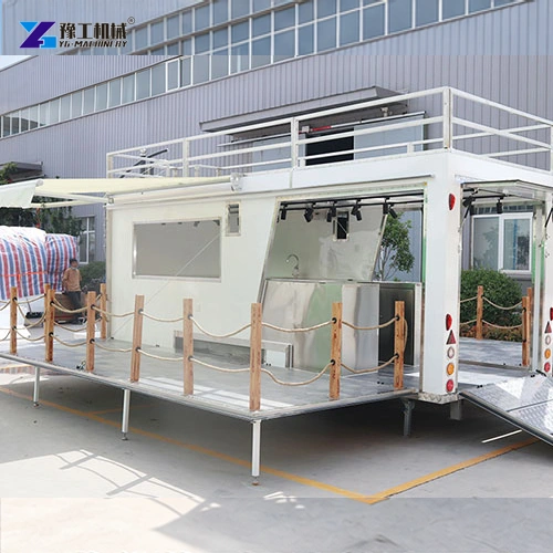 White catering trailer with an open side platform and roof rails